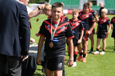 210525 - Pontypridd Schools v Bridgend - WSRU Junior Group - U11’s DC Thomas Cup Final - Pontypridd players collect their medals at full time