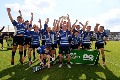 210525 - Pontypridd Schools v Bridgend - WSRU Junior Group - U11’s DC Thomas Cup Final - Bridgend players celebrate lifting the trophy at full time