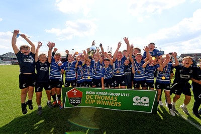 210525 - Pontypridd Schools v Bridgend - WSRU Junior Group - U11’s DC Thomas Cup Final - Bridgend players celebrate lifting the trophy at full time
