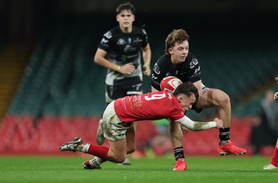 111225 - Pontypridd U16 Schools v Llanelli U16 Schools, Dewar Shield Final - Jake Ayers of Pontypridd Schools is tackled