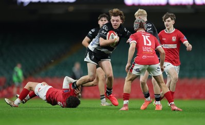 111225 - Pontypridd U16 Schools v Llanelli U16 Schools, Dewar Shield Final - Jake Ayers of Pontypridd Schools is tackled