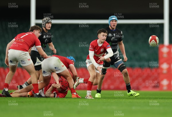 111225 - Pontypridd U16 Schools v Llanelli U16 Schools, Dewar Shield Final - Rowan Williams of Llanelli Schools feeds the ball out