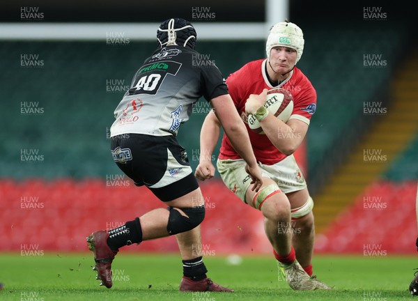111225 - Pontypridd U16 Schools v Llanelli U16 Schools, Dewar Shield Final - Ifan Gravell-Jones of Llanelli Schools takes on Tomas Williams of Pontypridd Schools
