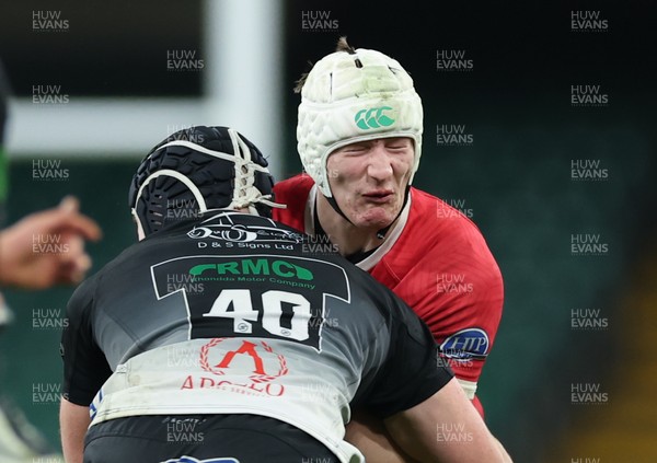 111225 - Pontypridd U16 Schools v Llanelli U16 Schools, Dewar Shield Final - Ifan Gravell-Jones of Llanelli Schools takes on Tomas Williams of Pontypridd Schools