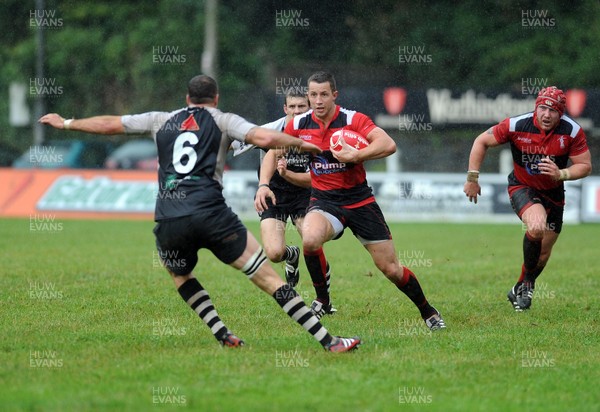 10.09.11. - Pontypridd v Aberavon-Principality Premiership. Aberavon's Richard Thomas breaks away with Pontypridd's captain Chris Dicomidis blocking the way..  