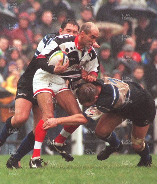 191096 - Pontypridd v Bath - Phil Ford of Pontypridd is tackled by Richard Webster