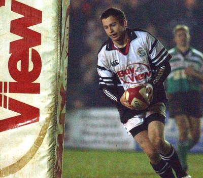 210203 - Pontypridd v Caerphilly - Welsh Premiership - Pontypridd's Gareth Wyatt crosses to score a try