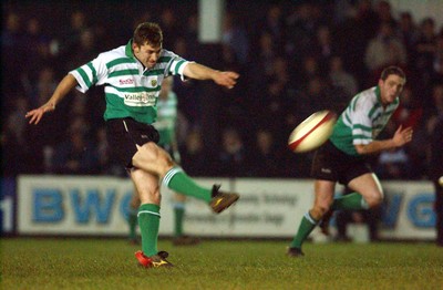 210203 - Pontypridd v Caerphilly - Welsh Premiership - Caerphilly's Justin Thomas kicks for goal