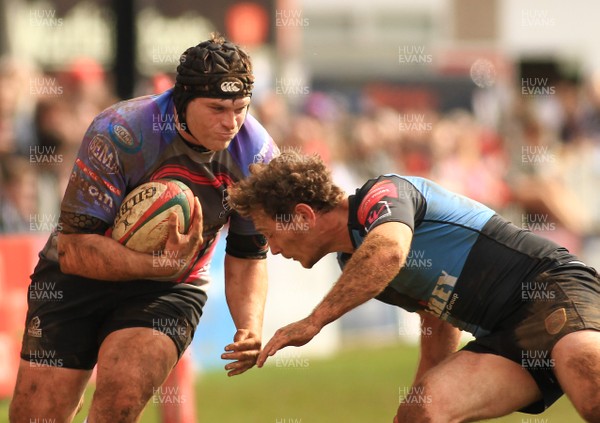 040415 - Pontypridd RFC v Cardiff RFC - Principality Premiership -Patrick Palmer of Pontypridd takes on James Loxton of Cardiff