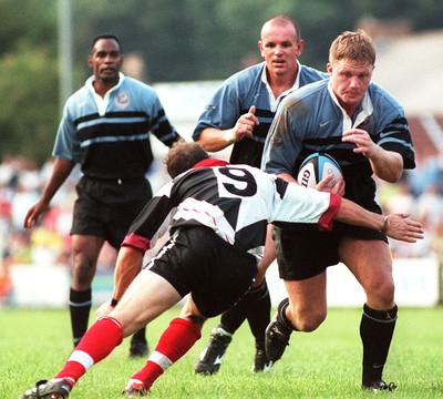 160897 - Pontypridd v Cardiff - Gwyn Jones takes on Paul John