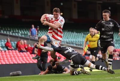 050425  Pontypridd v Cross Keys, WRU Premiership Cup Final -Louis Rocheford-Shugar of Pontypridd is tackled by Laurence Donnelly of Cross Keys