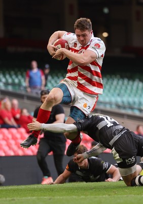 050425  Pontypridd v Cross Keys, WRU Premiership Cup Final -Louis Rocheford-Shugar of Pontypridd is tackled by Laurence Donnelly of Cross Keys