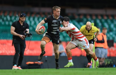 050425  Pontypridd v Cross Keys, WRU Premiership Cup Final - Tom Sullivan of Cross Keys looks to hold off Joe Davies of Pontypridd
