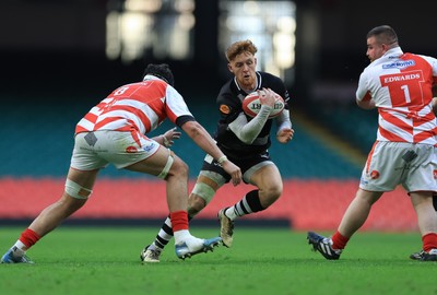 050425  Pontypridd v Cross Keys, WRU Premiership Cup Final - Laurence Donnelly of Cross Keys takes on Joe Miles of Pontypridd