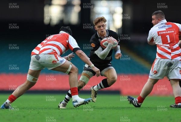 050425  Pontypridd v Cross Keys, WRU Premiership Cup Final - Laurence Donnelly of Cross Keys takes on Joe Miles of Pontypridd