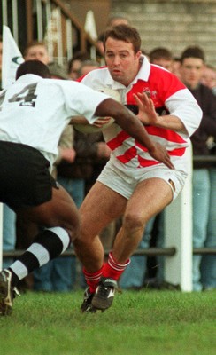 041195 - Pontypridd v Fiji - David Manley of Pontypridd is tackled by Emori Bolobolo