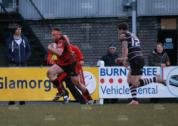 050413 Pontypridd RFC v Jersey RFC - British and Irish Cup -Jersey's James Gethings is chased by Pontypridd's Dafydd Lockyer