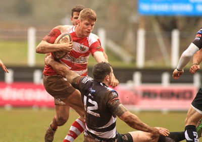 280315 - Pontypridd RFC v Llandovery RFC - Swalec Cup -Aaron Warren of Llandovery takes on Dafydd Lockyer of Pontypridd