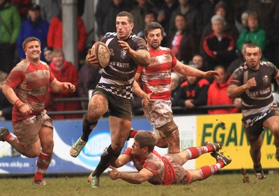 280315 - Pontypridd RFC v Llandovery RFC - Swalec Cup -Dafydd Lockyer of Pontypridd beats Matthew Jacobs of Llandovery