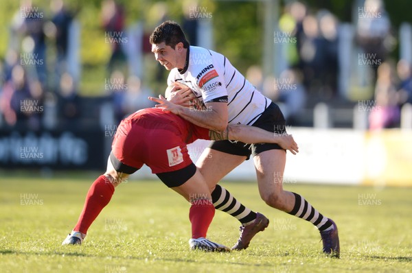 180513 - Pontypridd v Llanelli - Principality Premiership Final -Matthew Nuthall of Pontypridd is tackled by Kristian Phillips of Llanelli 