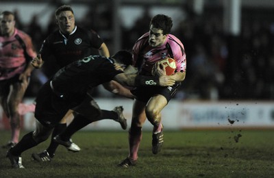 10.03.11 - Pontypridd v Neath - Principality Premiership - Owen Williams of Pontypridd is tackled by Gareth King of Neath. 