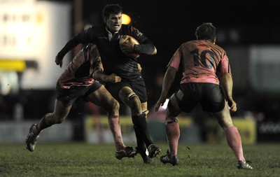 10.03.11 - Pontypridd v Neath - Principality Premiership - Lee Evans of Neath takes on Simon Humberstone of Pontypridd. 