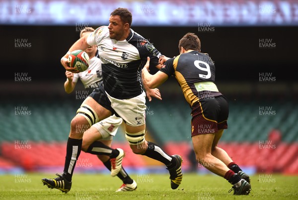 160417 - Pontypridd v RGC 1404 - National Cup Final - Chris Dicomidis of Pontypridd is tackled by Alex Schwarz of RGC