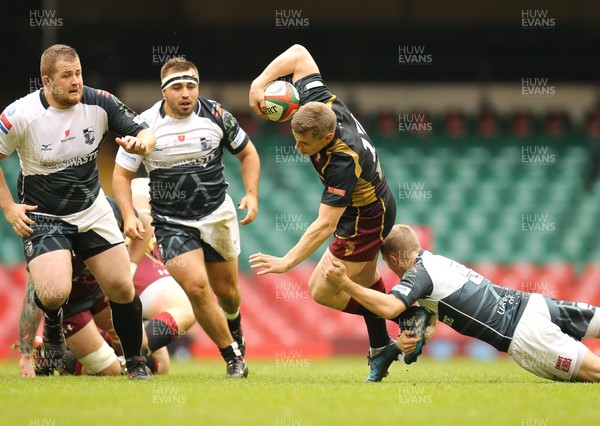 160417 - Pontypridd v RGC 1404, WRU National Cup Final - Tom Hughes of RGC is tackled by Wayne Evans of Pontypridd