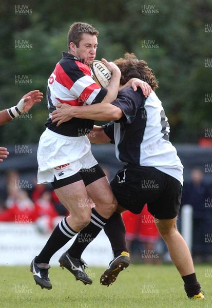 191002 - Pontypridd v Rugby Roma - Parker Pen Challenge Cup - Ponty's Gareth Wyatt is caught by Domenco De Luca