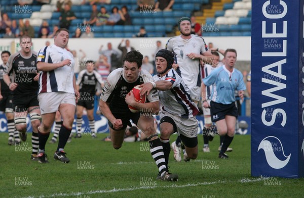 09.04.11 Pontypridd v Swansea SWALEC CUP Semi-Final Owen Williams scores the second try despite tackle by Matthew Morgan. 