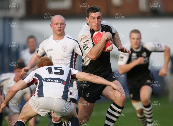 09.04.11 Pontypridd v Swansea SWALEC CUP Semi-Final Ponty's Dafydd Lockyer takes on James Dixon. 