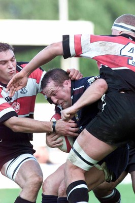 260800 - Pontypridd v Swansea - Swansea's Garin Jenkins tries to burrow his way through the Pontypridd defence