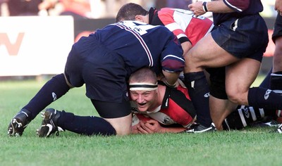 260800 - Pontypridd v Swansea - Pontypridd's Robert Sidoli is all smiles as he scores try