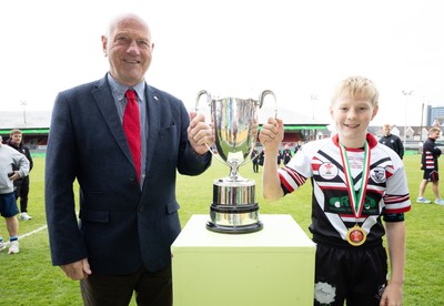 280426 - Pontypridd v Swansea, DC Thomas Cup Final - Pontypridd captain Dafydd Evans recieves the DC Thomas Cup  from WRU President Terry Cobner