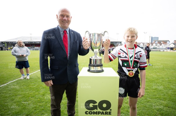280426 - Pontypridd v Swansea, DC Thomas Cup Final - Pontypridd captain Dafydd Evans recieves the DC Thomas Cup  from WRU President Terry Cobner