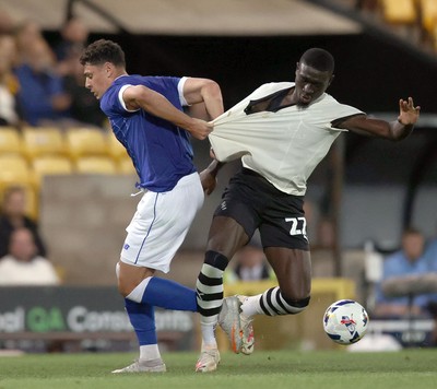 070825 - Port Vale v Cardiff City - Sky Bet League 1 - Yousef Saleh of Cardiff is undone by Jesse Debrah of Port Vale