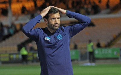 070825 - Port Vale v Cardiff City - Sky Bet League 1 - Manager Brian Barry-Murphy of Cardiff applauds the travelling fans at the end of the match