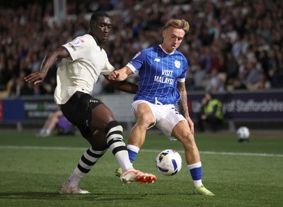 070825 - Port Vale v Cardiff City - Sky Bet League 1 - Isaak Davies of Cardiff and Jesse Debrah of Port Vale