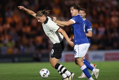 070825 - Port Vale v Cardiff City - Sky Bet League 1 - Ryan Wintle of Cardiff tackles Lorent Tolaj of Port Vale