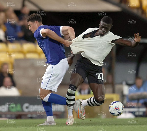 070825 - Port Vale v Cardiff City - Sky Bet League 1 - Yousef Saleh of Cardiff is undone by Jesse Debrah of Port Vale