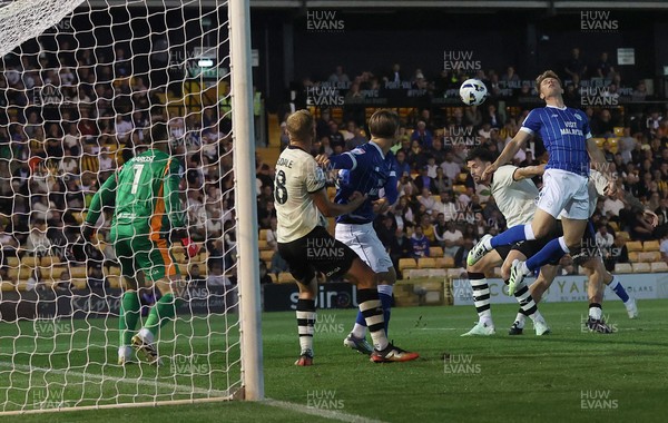 070825 - Port Vale v Cardiff City - Sky Bet League 1 - Will Fish of Cardiff tries a header on goal