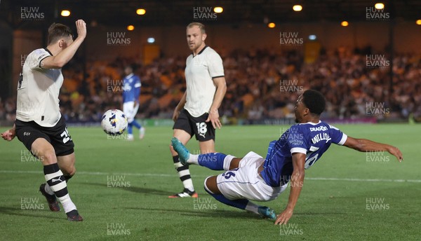 070825 - Port Vale v Cardiff City - Sky Bet League 1 - Chris Willock of Cardiff tries to put the ball past Kyle John of Port Vale