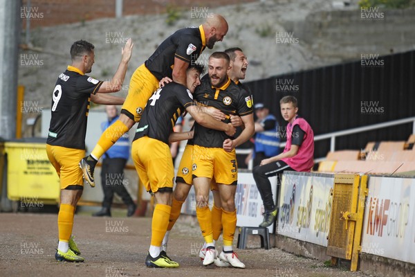 010918 - Port Vale v Newport County, Sky Bet League 2 - Dan Butler of Newport County (right) celebrates scoring his side's second goal with team mates