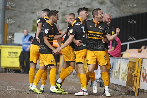 010918 - Port Vale v Newport County, Sky Bet League 2 - Dan Butler of Newport County (centre) celebrates scoring his side's second goal with team mates