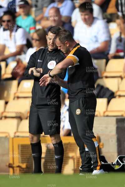 010918 - Port Vale v Newport County, Sky Bet League 2 - Newport County Manager Michael Flynn (right) checks how much injury time is left with the fourth official