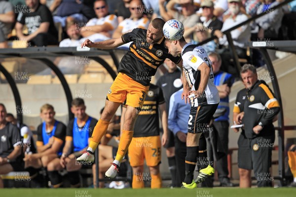 010918 - Port Vale v Newport County, Sky Bet League 2 - Dan Butler of Newport County (left) in action with James Gibbons of Port Vale