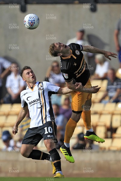 010918 - Port Vale v Newport County, Sky Bet League 2 - Matthew Dolan of Newport County (right) in action with Ricky Miller of Port Vale