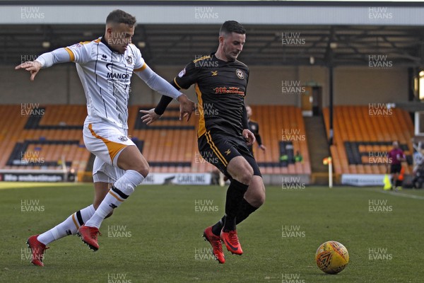 240218 - Port Vale v Newport County, Sky Bet League 2 - Padraig Amond of Newport County (right) in action with  Kyle Howkins of Port Vale