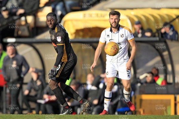 240218 - Port Vale v Newport County, Sky Bet League 2 - Frank Nouble of Newport County (left) in action with Joe Davis of Port Vale