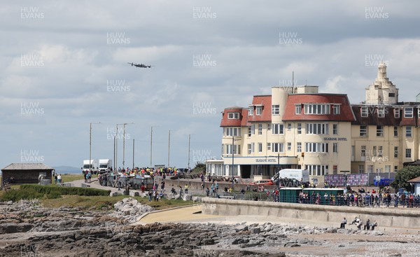 030722 - Run 4 Wales Healthspan Porthcawl 10k - A World War II Lancaster flies over Porthcawl as families take part in the Fun Run, the final event of the day